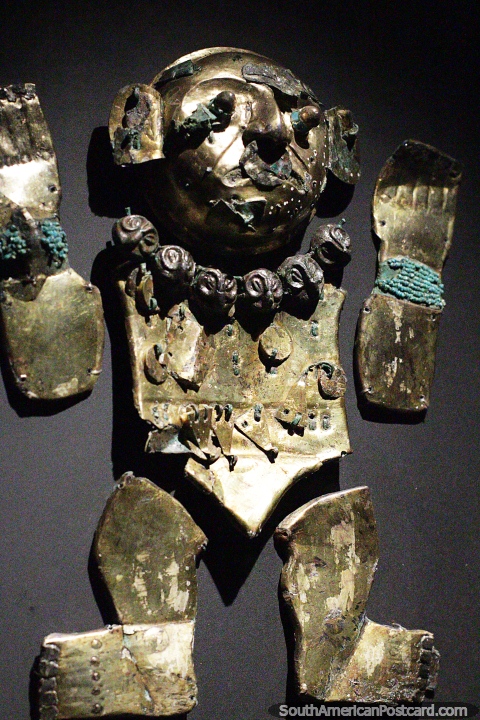 Metalwork of a figure used as a symbolic emblem, Sipan museum, Lambayeque. (480x720px). Peru, South America.