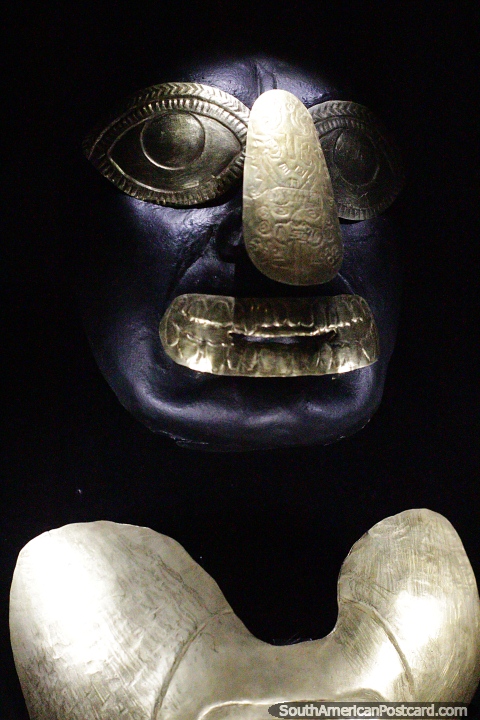 With funeral ornaments of gold, a face is designed, Sipan museum, Lambayeque. (480x720px). Peru, South America.