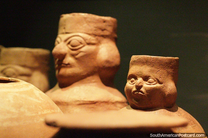 Drinking vessels with serious faces, ceramic work at the Sipan museum in Lambayeque. (720x480px). Peru, South America.