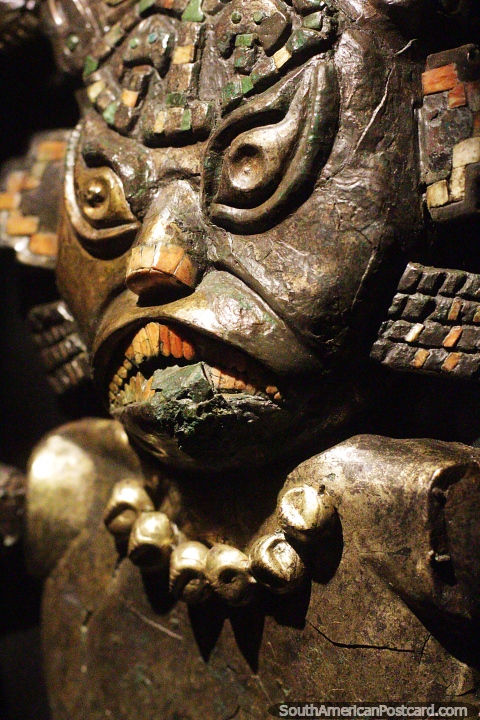 Copper funeral mask with intricate design, Moche culture, Sipan museum, Lambayeque.  (480x720px). Peru, South America.