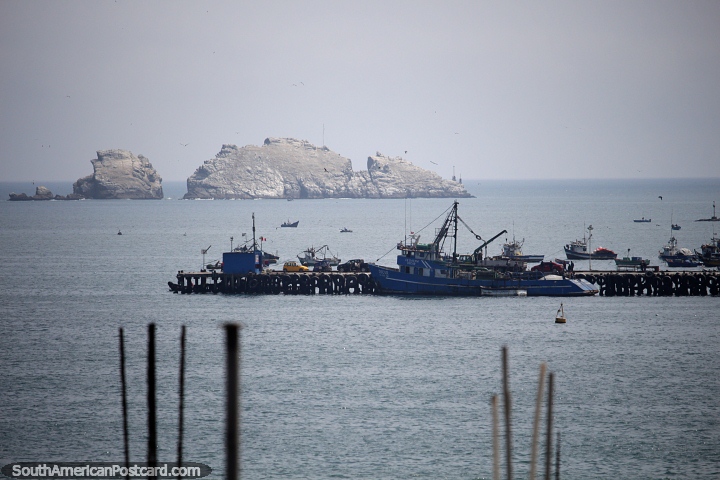 Broken islands and rock in the harbor and the wharf in Chimbote. (720x480px). Peru, South America.