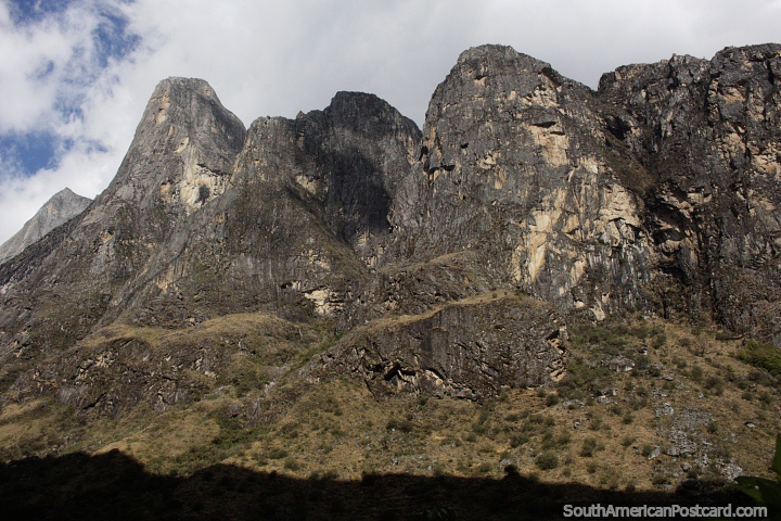 Huge rock faces tower above in the mountains around Paron Lake in Caraz. (720x480px). Peru, South America.