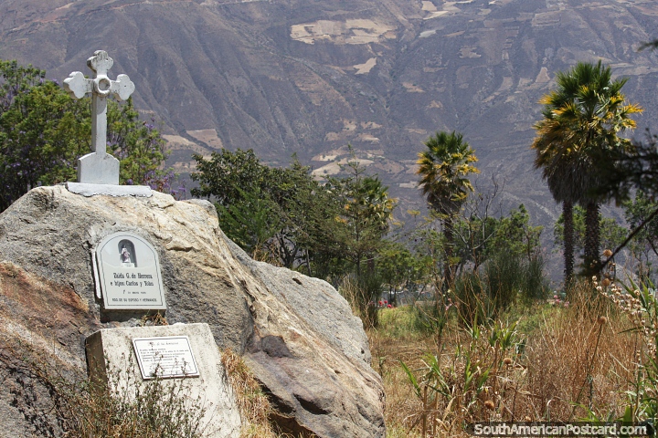 Huge boulder with a cross, a memorial to a family at Campo Santo in Yungay. (720x480px). Peru, South America.