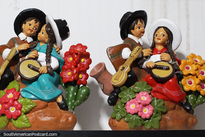 Couples in love with each other and music, painted figures at the arts center, Ayacucho. (720x480px). Peru, South America.