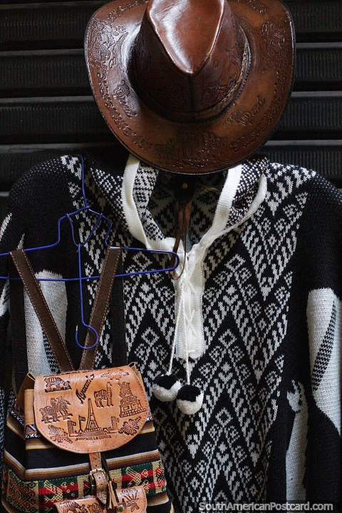 Leather hat and bag and black and white shawl, crafts center in Ayacucho. (480x720px). Peru, South America.