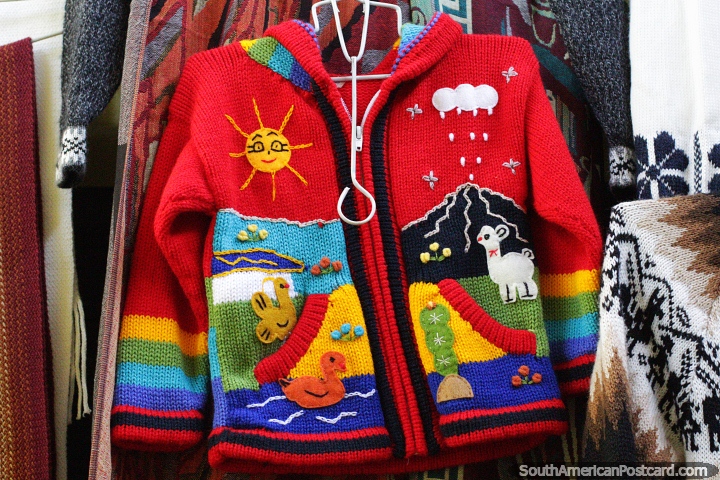 Woolen jersey with animals for children, nice clothing at the crafts center in Ayacucho. (720x480px). Peru, South America.