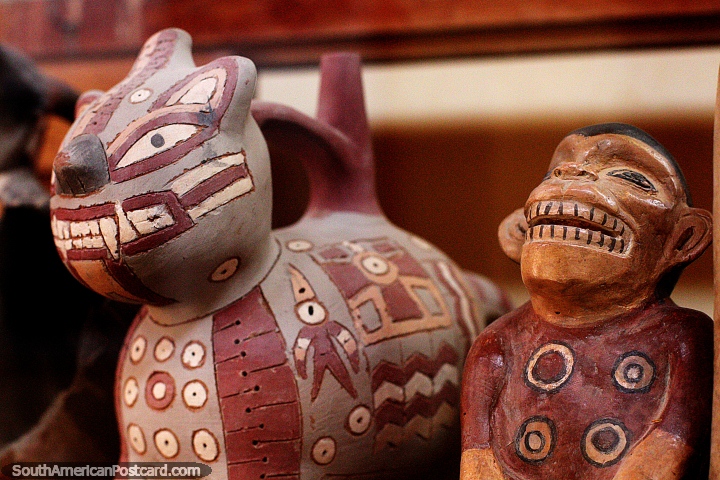 Ceramics at the Maria Reiche Museum near Nazca, the grinning man. (720x480px). Peru, South America.