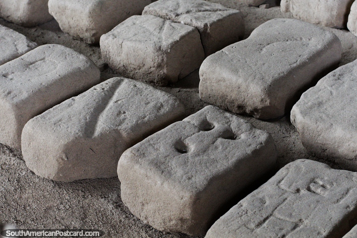 Bricks with designs that represent different families at the Ceremonial Enclosure at the Moche city, Trujillo. (720x480px). Peru, South America.