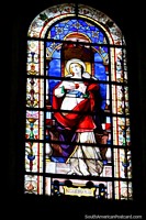 Stained glass window of a woman at the cathedral in Cayenne, French Guiana. The 3 Guianas, South America.