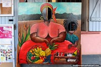 Painting of a woman with a fruit basket, with face holes, Saint Laurent du Maroni, French Guiana. The 3 Guianas, South America.