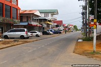 One of the central streets with a few shops in Nickerie, Suriname.