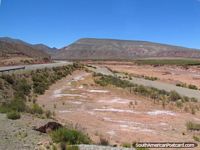 The terrain begins to change south of Abra Pampa. Argentina, South America.