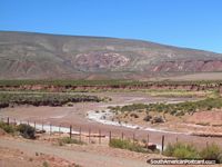Larger version of Dry river bed and mountains between La Quiaca and Jujuy.