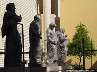 Statues of 4 religious figures outside the cathedral in San Juan.