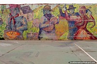 Músicos y bailarines, un viejo colorido mural en Salta. Argentina, Sudamerica.