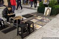 Argentina Photo - An artist draws pastel colored drawings in Buenos Aires.