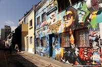 A cool and colorful mural gives this quiet city street a lift in Buenos Aires. Argentina, South America.
