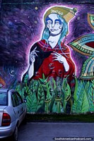 Larger version of Bohemian woman and bubbles in a garden, street art in Villa La Angostura.