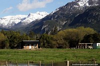 A beautiful place to build a house, below huge mountains on green farmland, Los Cipreses. Argentina, South America.