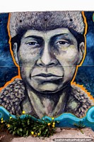 Cara de un hombre indígena de la Tierra del Fuego, están extintos, arte callejero en Ushuaia. Argentina, Sudamerica.