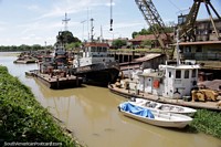 Argentina Photo - Port area in Parana with boats and cranes, the Parana River.