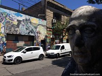 Ceramic bust and street art in La Boca in Buenos Aires.
