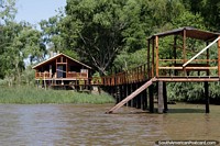 Wooden house with private jetty on the banks of the river in Tigre, Buenos Aires, what a life! Argentina, South America.