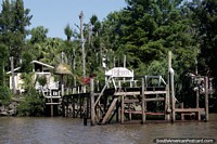 House beside the river with a forest surrounding it, private jetty, Tigre, Buenos Aires. Argentina, South America.