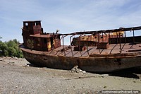 Shipwreck on the beach at low tide in San Antonio Oeste. Argentina, South America.