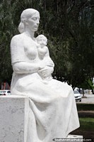 Mother and baby monument, bright white, the plaza, San Antonio Oeste. Argentina, South America.