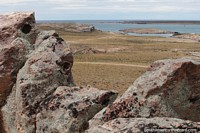A beautiful terrain of rock by the sea in Puerto Deseado. Argentina, South America.