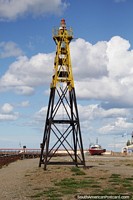 Tall lighthouse tower at the port in Rio Gallegos.