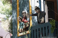 Characters on balconies like in La Boca in the capital, but this is in Mendoza. Argentina, South America.