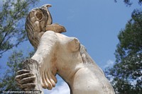 Woman with a birds head and wings, larger than life ceramic work at the park in Santiago del Estero.