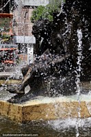 Bronze figure bathing in the fountain at the plaza in Santiago del Estero.