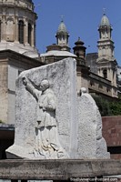 Religious figure, monument below the towers of the cathedral in Rosario. Argentina, South America.