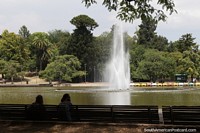 Independence Park (Parque Independencia) with a large lagoon and fountain in Rosario. Argentina, South America.
