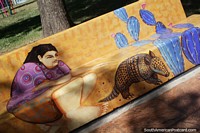 Woman, armadillo and cactus, mural in the plaza in Resistencia of the Chaco culture. Argentina, South America.