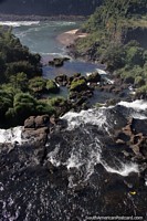 The upper trail above the Iguazu River at the waterfalls in Puerto Iguazu. Argentina, South America.