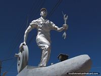 A railway mechanic monument in Uyuni, with spanner and wheel. Bolivia, South America.