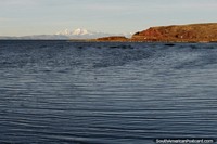 Bolivia Photo - Lake Titicaca with snow-capped mountain in the distance, view from Desaguadero.
