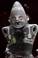 Figure of a woman with a pair of moles and facial paint, Chancay culture of Peru, Musef, Sucre. Bolivia, South America.