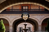 Entrance to the National Mint (La Casa de Moneda) with the famous face and archway, Potosi. Bolivia, South America.