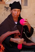 A ball of pink wool, visit Puka-Puka near Sucre to see indigenous people create their crafts. Bolivia, South America.