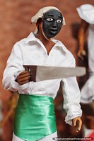 Japutuqui, máscara feita da madeira, um bailarino que mantém uma serra, figuram no Museu de Kenneth Lee em Trinidad. Bolívia, América do Sul.