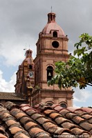 Cathedral Basilica of St. Lawrence in Santa Cruz, the bell tower and clock tower, red brick construction. Bolivia, South America.