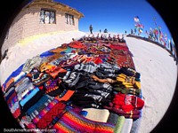 Warm clothing, scarves,  woolen hats and mittens, you need clothes like this for the salt flats tour in Uyuni. Bolivia, South America.
