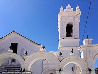 Basilica San Francisco with tower and arches in Sucre, one of many white churches in the city. Bolivia, South America.