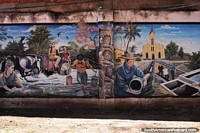 Before and after 1966, a mural in Robore showing life before and after easy water access.