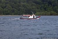 Small passenger boat in the waters around Ilha do Mel.